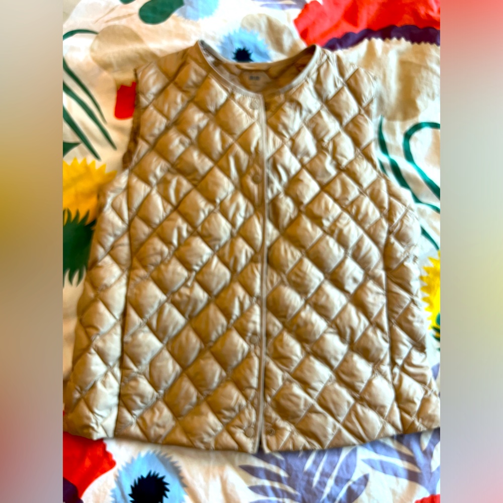 UNIQLO Pufftech warm padded vest in beige